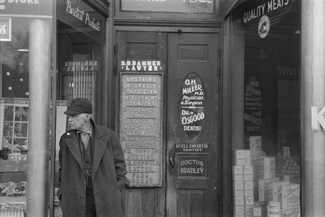 history of Iowa, Businesses and Factories, Library of Congress, window display, trench coat, store entrance, general store, Iowa History, farmer, Iowa, storefront, Portraits - Individual