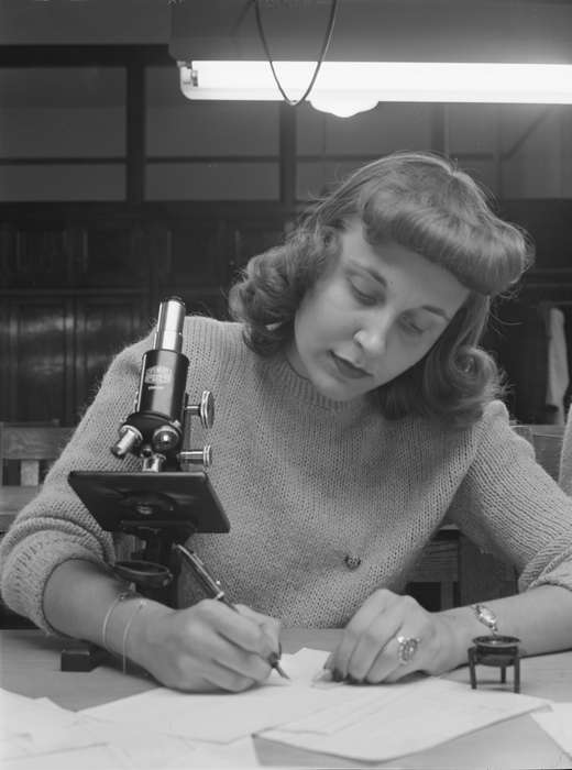 Labor and Occupations, woman, watch, Iowa History, ring, microscope, curls, Portraits - Individual, Iowa, rolls, fountain pen, ink well, Library of Congress, sweater, victory, girl, history of Iowa, bangs