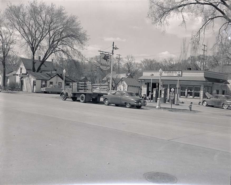 Waverly Public Library, Main Streets & Town Squares, mainstreet, storefront, delivery truck, Cities and Towns, studebaker, history of Iowa, Iowa, Iowa History, Waverly, IA, Motorized Vehicles, Businesses and Factories, gas station, gas pump