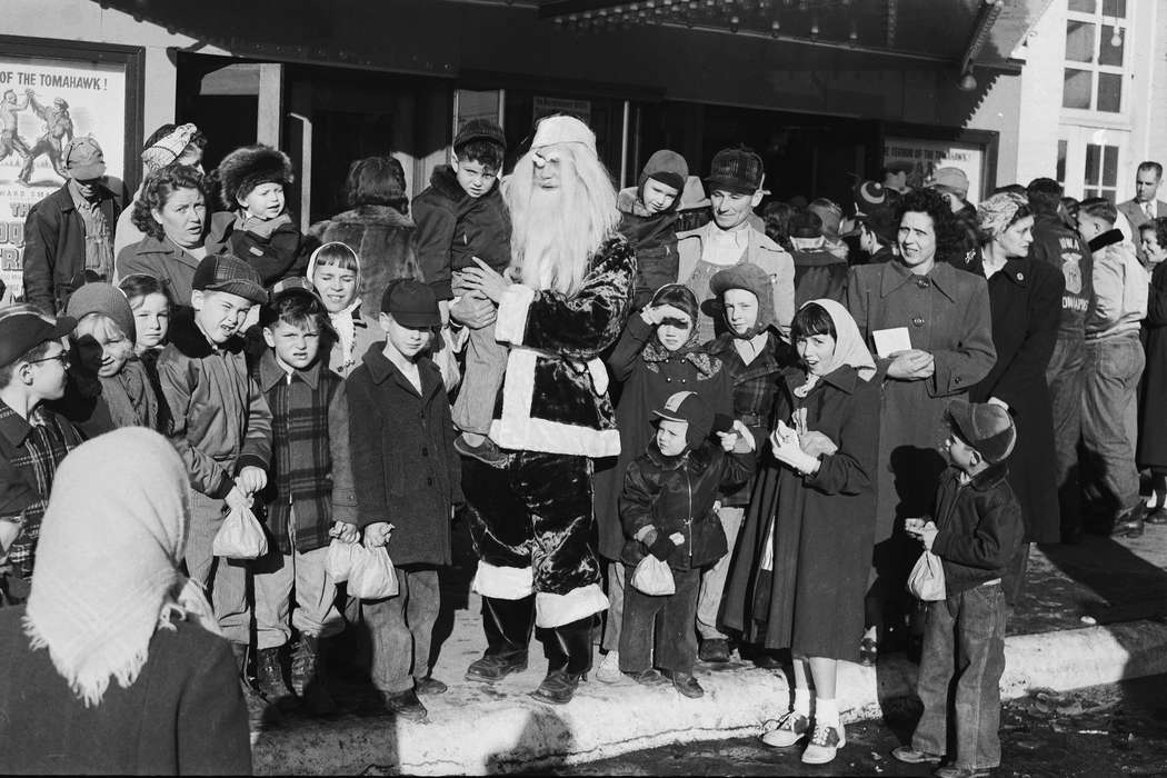 Portraits - Group, Businesses and Factories, movie theater, Families, santa claus, Holidays, history, Photos, winter coat, Children, headscarf, Iowa, IA, Cities and Towns, santa, United States, ia, Entertainment, Main Streets & Town Squares, Coon Rapids Enterprise, historic, winter, Coon Rapids