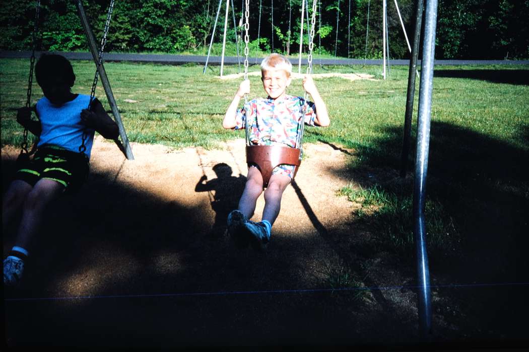 ia, playground, Iowa, shadow, Leisure, Coon Rapids Enterprise, Children, United States, sunny, Travel, boy, second grade missouri trip, history, Portraits - Individual, swing set, park, Photos, playground equipment, missouri trip, historic, MO, school trip