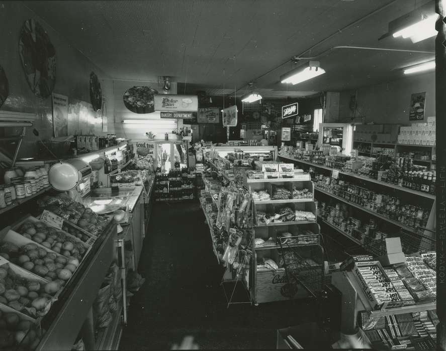 scale, plants, candy, glove, bottle, 7up, calendar, produce, Food and Meals, Iowa, Waverly Public Library, Iowa History, correct date needed, history of Iowa, Businesses and Factories, grocery store, bread, shopping cart, pepsi