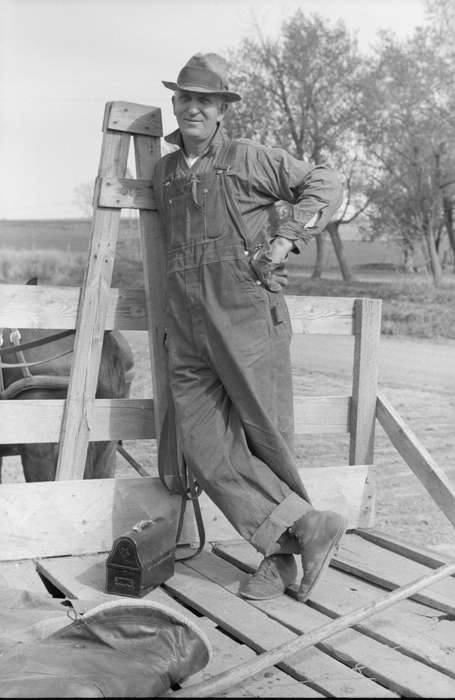 lunch, lunchbox, overalls, Iowa History, Labor and Occupations, Farming Equipment, Portraits - Individual, hat, boots, history of Iowa, Library of Congress, man, Iowa, glove