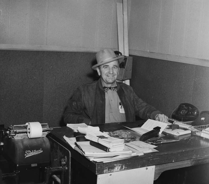 Businesses and Factories, Portraits - Individual, United States, bowtie, history, ia, Photos, Labor and Occupations, rotary telephone, Coon Rapids Enterprise, accountant, historic, desk, Iowa, IA, hat, Coon Rapids