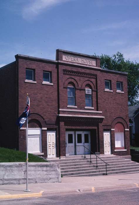 sidewalk, storefront, Businesses and Factories, Cities and Towns, stairs, Iowa, flag, pole, opera, Library of Congress, history of Iowa, Entertainment, Iowa History