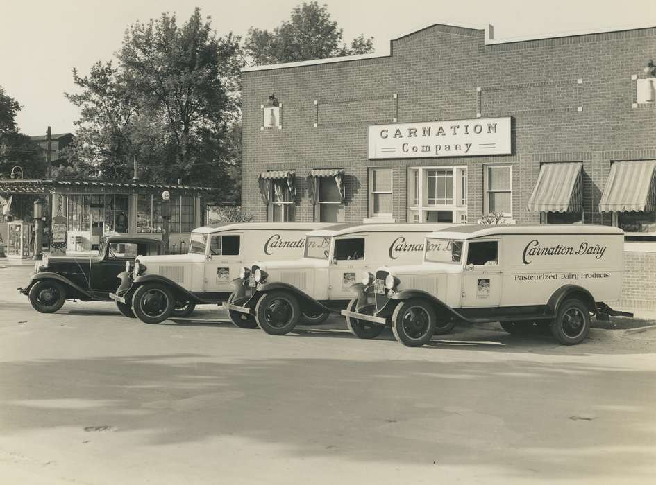 Iowa History, building, awning, headlights, tire, delivery, wheels, dairy, tires, Motorized Vehicles, brick, O'Brink, Lisa, Cities and Towns, Businesses and Factories, Iowa, history of Iowa, trucks, Labor and Occupations, truck