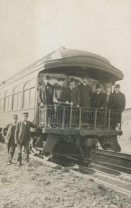 Labor and Occupations, bow tie, Grout Museum of History and Science, Leisure, hat, uniform, suit, Photos, passenger train, railing, Portraits - Group, Iowa, historic, Motorized Vehicles, location needed, man, derby, history, train, ia, newsboy cap