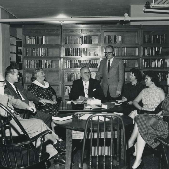 history of Iowa, book shelf, table, desk, ashtray, Iowa, correct date needed, suit, Iowa History, Waverly, IA, Waverly Public Library, wooden chair, glasses, Portraits - Group, group, book, symphony board