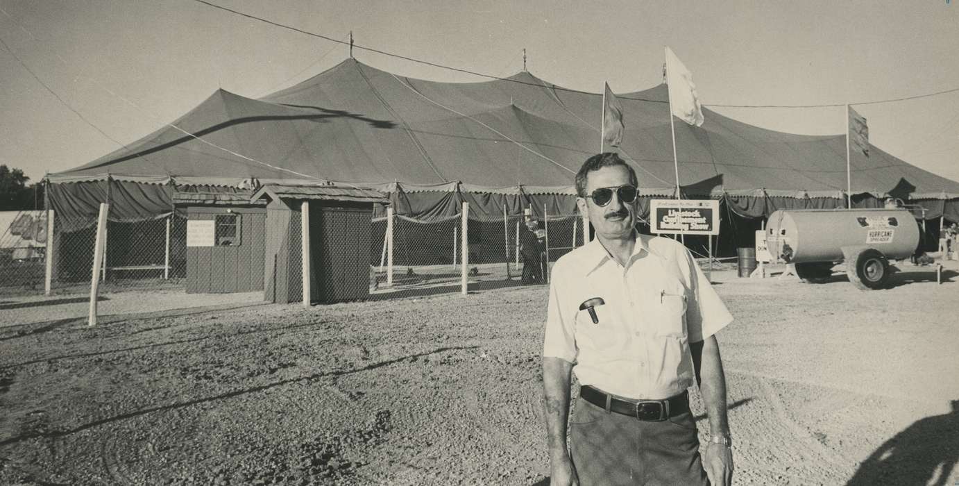 mustache, sunglasses, Iowa, United States, tent, Waterloo, Photos, Grout Museum of History and Science, IA, fence, Fairs and Festivals, adult man, Black Hawk, historic, national cattle congress, Portraits - Individual, ia, history