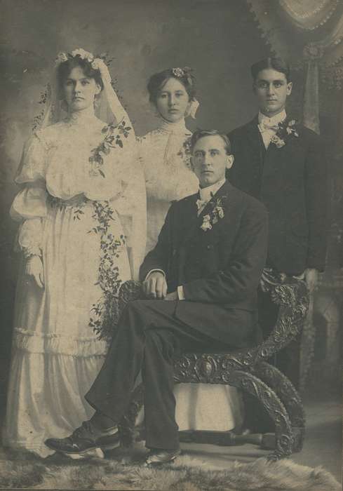 suit, dress shoes, O'Brink, Lisa, Iowa History, garland, boutonniere, wedding veil, Iowa, rug, history of Iowa, wedding dress, chair, savonarola chair, backdrop, victorian, Portraits - Group, fur, Weddings