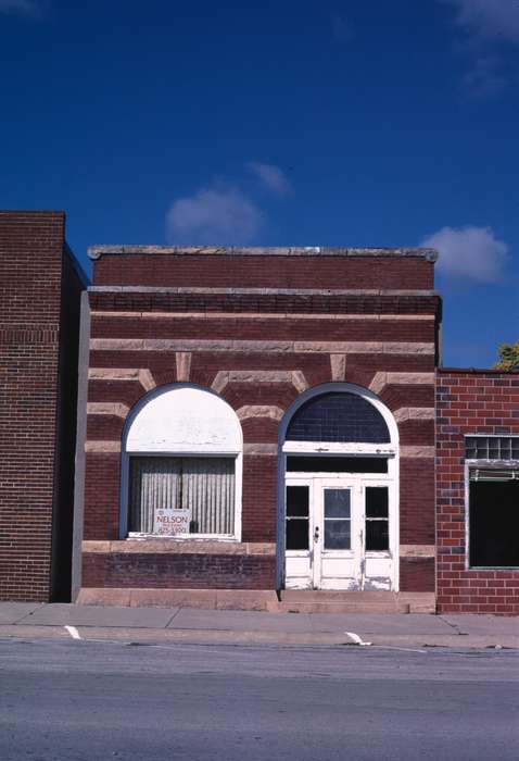 curb, Iowa History, Businesses and Factories, arch, brick, history of Iowa, Cities and Towns, Iowa, storefront, sidewalk, Library of Congress