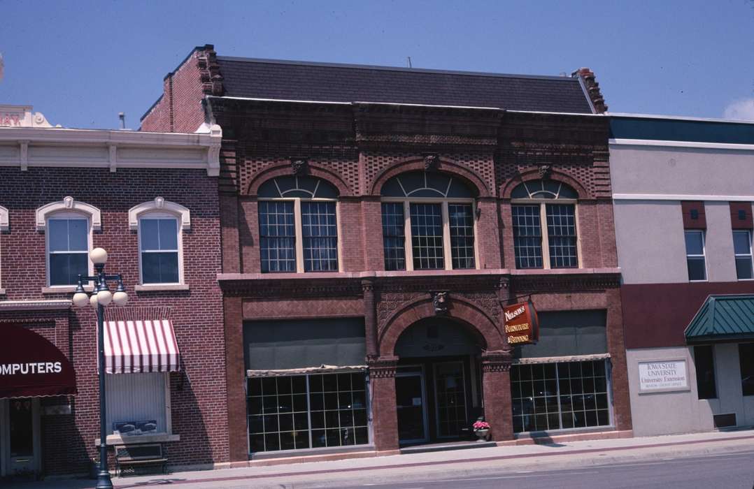 storefront, awning, brick, Businesses and Factories, Cities and Towns, Iowa, Library of Congress, history of Iowa, Iowa History