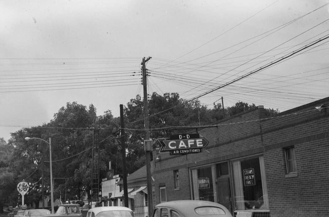 Businesses and Factories, United States, history, ia, Photos, power lines, cars, Coon Rapids Enterprise, historic, utility worker, signage, Iowa, IA, cafe, Cities and Towns, Coon Rapids, Motorized Vehicles