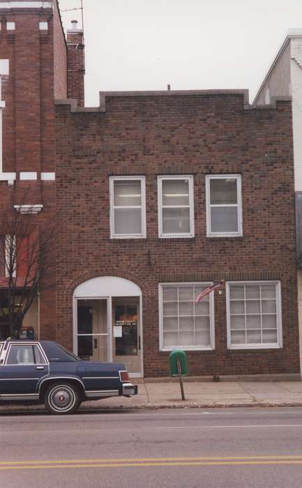 correct date needed, mainstreet, Cities and Towns, Iowa, brick building, Motorized Vehicles, history of Iowa, parking meter, Waverly Public Library, Main Streets & Town Squares, Iowa History