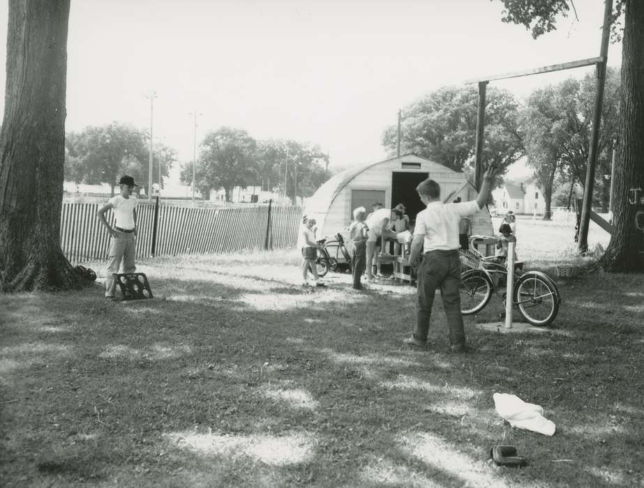 bicycle, Children, game, history of Iowa, Waverly Public Library, Iowa History, wooden fence, bike, park, Outdoor Recreation, Iowa, quonset
