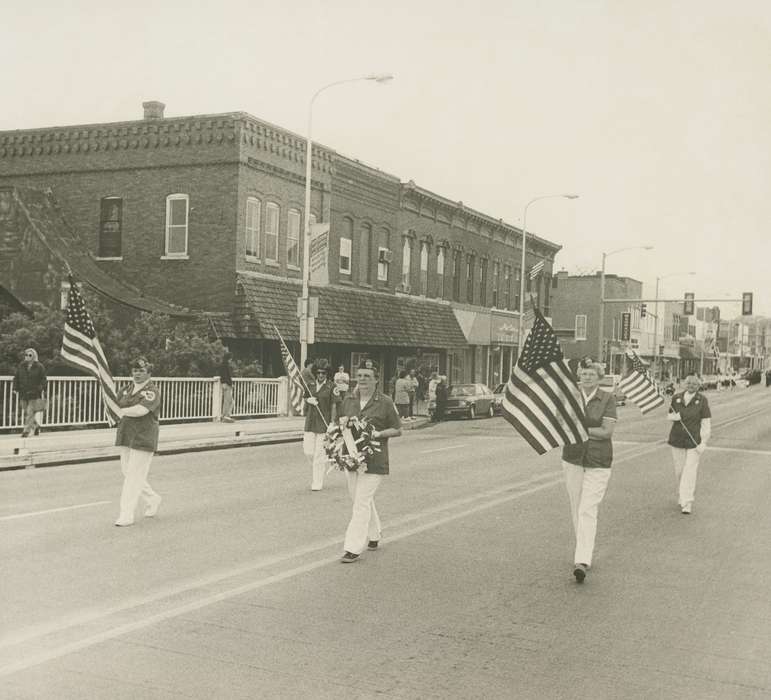 history of Iowa, Military and Veterans, woman, bridge, holiday, Waverly Public Library, parade, Waverly, IA, Iowa, brick building, Iowa History, wreath, american flag, uniform, Main Streets & Town Squares