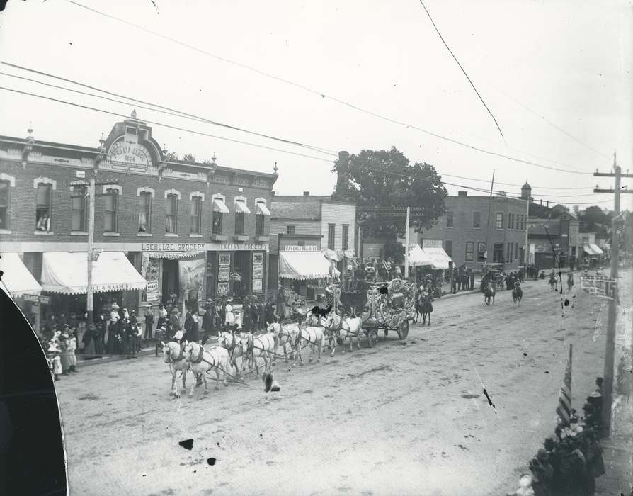 Businesses and Factories, Children, parade, Travel, Iowa History, Entertainment, Waverly, IA, Iowa, Waverly Public Library, Fairs and Festivals, circus, Main Streets & Town Squares, horse, Cities and Towns, Families, history of Iowa, horse drawn wagon, downtown