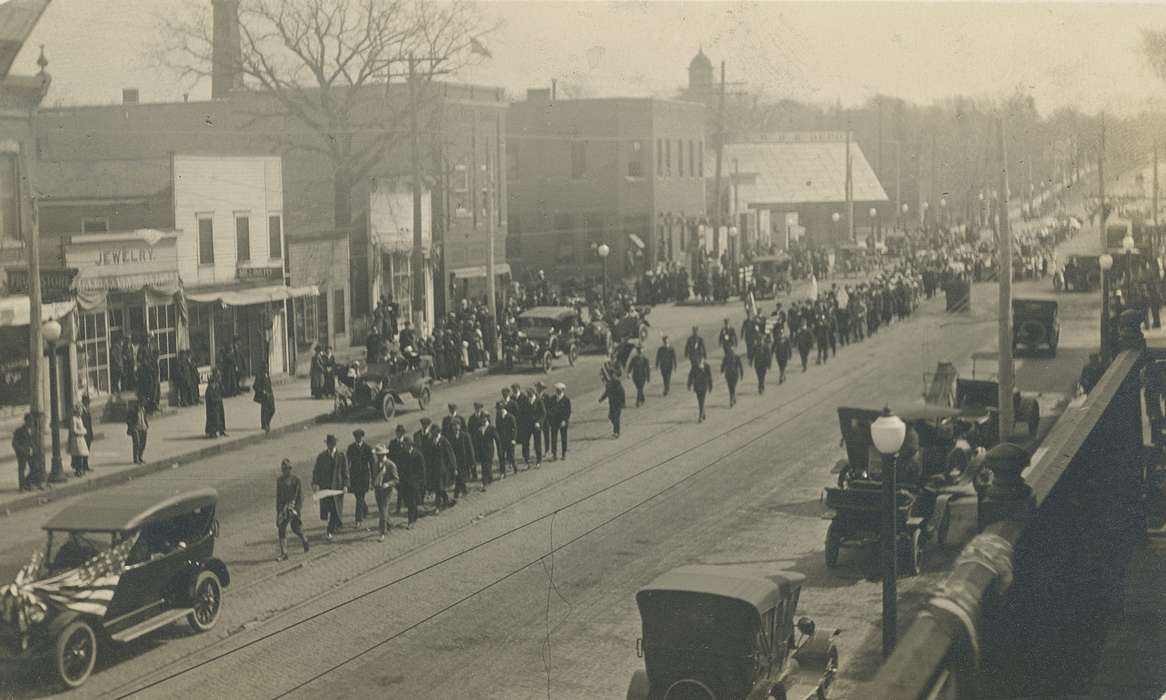 Waverly Public Library, Cities and Towns, Iowa History, military, history of Iowa, Businesses and Factories, trucks, Motorized Vehicles, Military and Veterans, Main Streets & Town Squares, Civic Engagement, military parade, Families, Waverly, IA, main street, Iowa