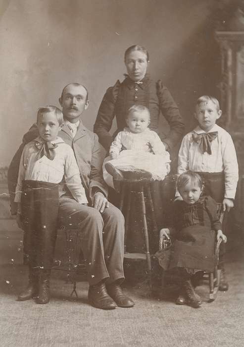 siblings, woman, family, girl, mustache, Portraits - Group, man, painted backdrop, Children, Iowa, Families, cabinet photo, high buttoned shoes, Olsson, Ann and Jons, history of Iowa, Maquoketa, IA, Iowa History, baby, boy