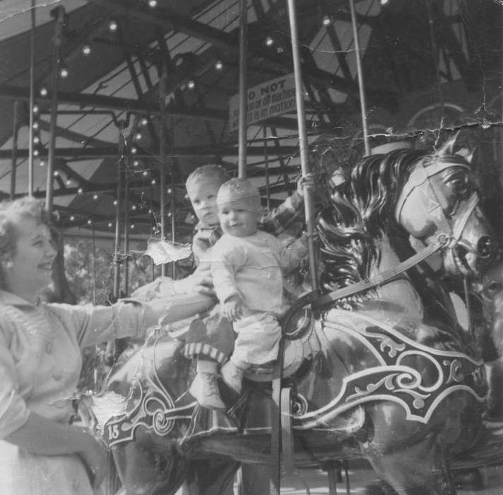 Patterson, Donna and Julie, carousel, marry go round, mother, Leisure, Children, IA, Iowa History, Iowa, history of Iowa, baby
