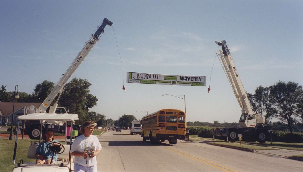 Waverly Public Library, bus, history of Iowa, Outdoor Recreation, Iowa, Iowa History, Waverly, IA, crane, highway, ragbrai