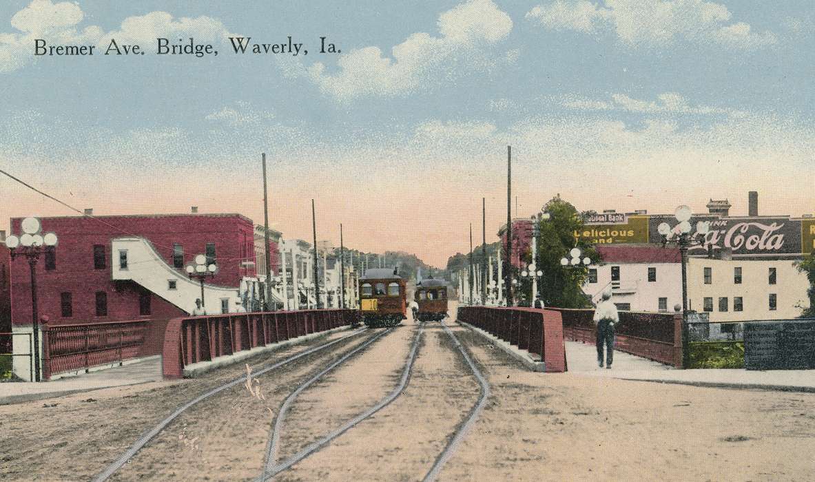 Cities and Towns, Iowa History, bridge, Meyer, Sarah, history of Iowa, Businesses and Factories, trolley, Motorized Vehicles, Main Streets & Town Squares, Waverly, IA, train tracks, main street, correct date needed, Iowa, coca cola