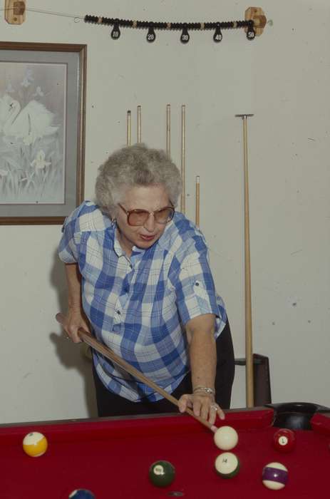 billiard table, Western Home Communities, short hairstyle, Sports, earring, Iowa History, history of Iowa, ball, Leisure, outfit, pool table, Iowa, glasses, Homes, old woman