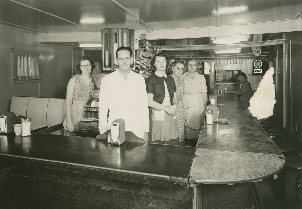 Portraits - Group, Coon Rapids Enterprise, Businesses and Factories, Cities and Towns, cash register, clock, napkin dispenser