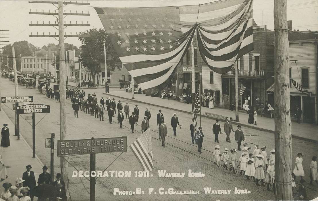 child, Iowa History, parade, Iowa, brick building, Entertainment, Main Streets & Town Squares, store, american flag, Meyer, Mary, history of Iowa, power poles, Cities and Towns, Aerial Shots