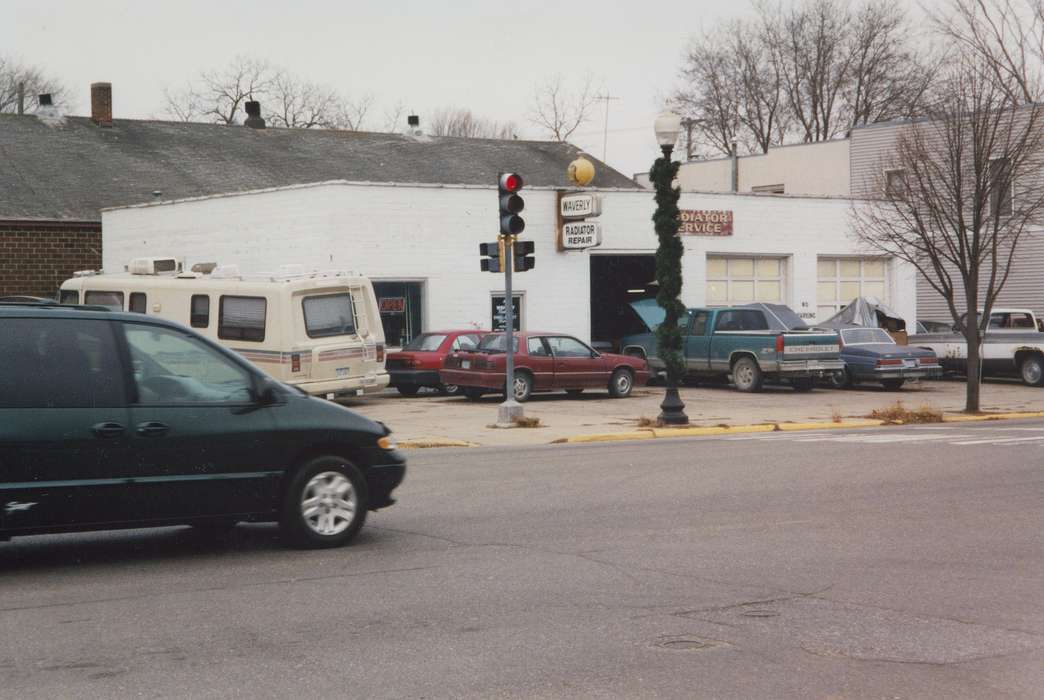 storefront, mainstreet, Main Streets & Town Squares, Cities and Towns, Waverly Public Library, Businesses and Factories, street corner, auto shop, Iowa History, Motorized Vehicles, history of Iowa, Iowa, correct date needed