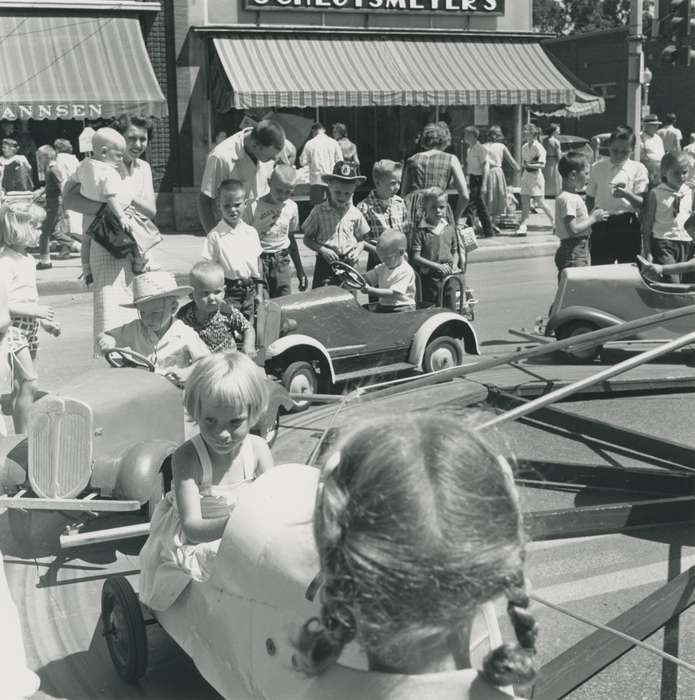 Children, crowd, Iowa History, Waverly, IA, Iowa, correct date needed, Fairs and Festivals, Waverly Public Library, Main Streets & Town Squares, awning, carnival ride, history of Iowa