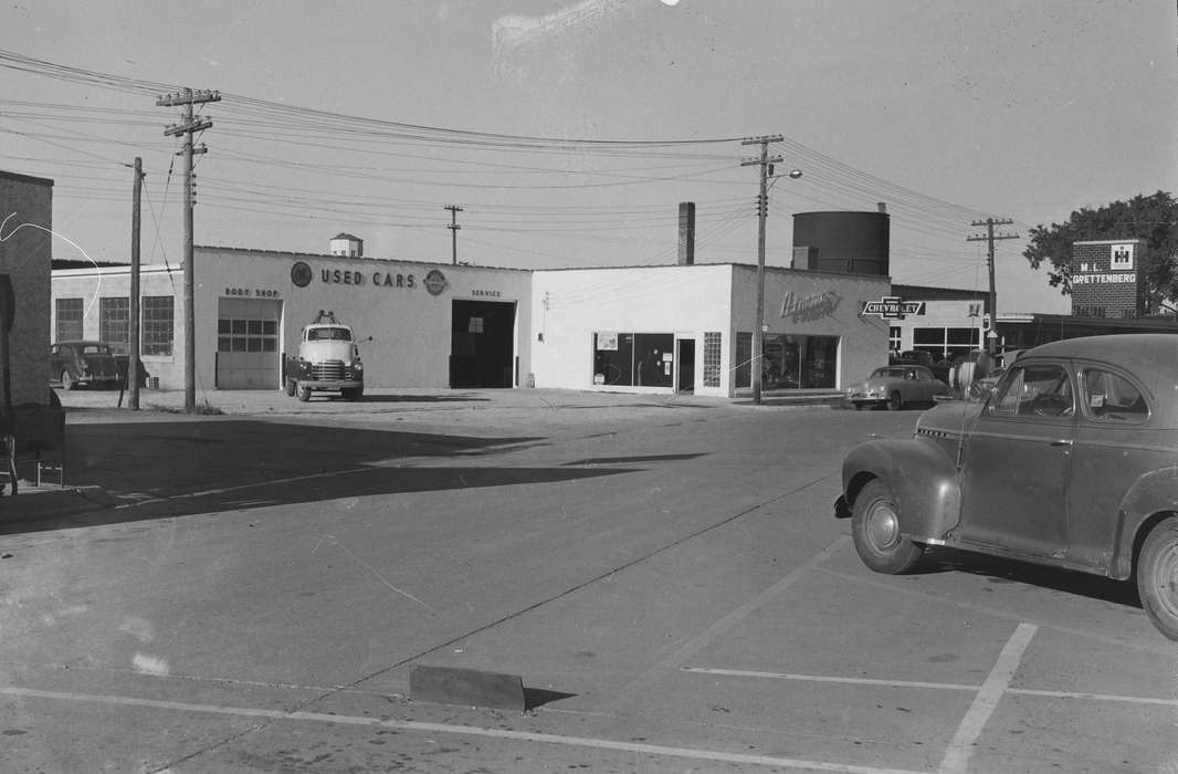 case ih, chevrolet, IA, Cities and Towns, historic, Motorized Vehicles, Coon Rapids, auto body shop, cars, international harvester, Businesses and Factories, Iowa, United States, Photos, history, ia, Coon Rapids Enterprise, power lines