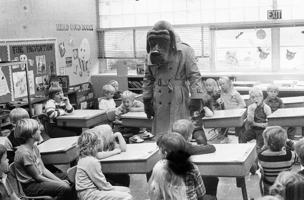 mcgruff the crime dog, Coon Rapids, Coon Rapids Enterprise, student, historic, Schools and Education, ia, Children, trench coat, elementary students, school desk, Iowa, desk, elementary school, United States, trenchcoat, IA, mascot, history, Photos, elementary, classroom