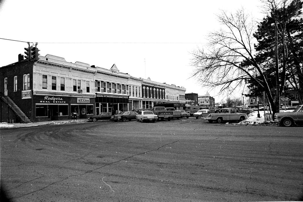 Bloomfield, IA, Schools and Education, Motorized Vehicles, car, storefront, truck, Iowa History, Lemberger, LeAnn, store, parking lot, town square, Cities and Towns, Iowa, ford, history of Iowa