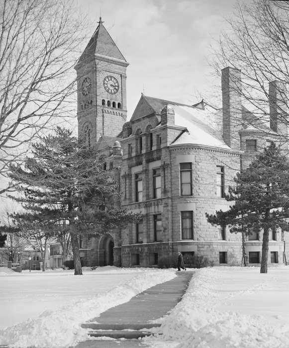 clock tower, stone building, Winter, Businesses and Factories, courthouse, Cities and Towns, history of Iowa, sidewalk, tree, pine tree, Iowa, Main Streets & Town Squares, snow, Library of Congress, Iowa History