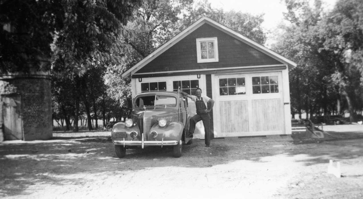 car, building, window, Portraits - Individual, man, Cedar Falls, IA, Walker, Erik, Iowa, Iowa History, overalls, Motorized Vehicles, history of Iowa, garage