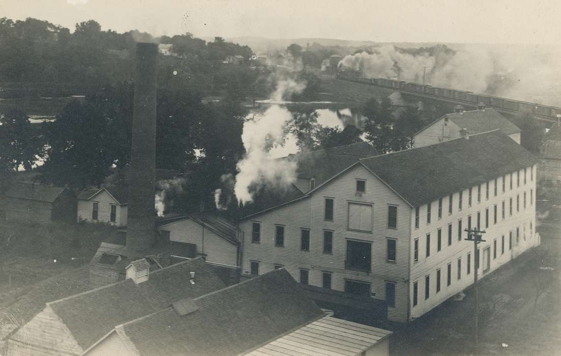 Cities and Towns, Landscapes, Businesses and Factories, smoke, Waverly Public Library, Iowa History, Waverly, IA, train bridge, Iowa, Aerial Shots, train, history of Iowa, plant, Labor and Occupations