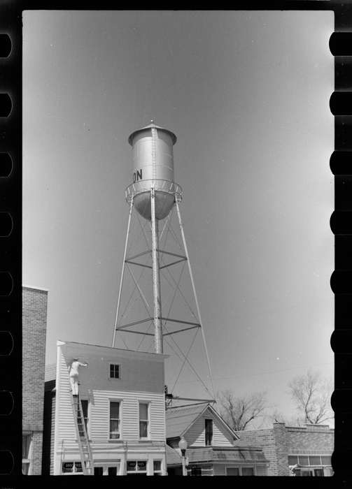 history of Iowa, Library of Congress, Main Streets & Town Squares, Iowa History, Iowa, storefront, water tower, watertower, Cities and Towns