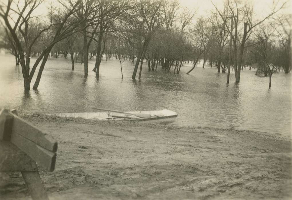 Iowa, canoe, flood aftermath, Iowa History, Zischke, Ward, Floods, Cedar Falls, IA, trees, history of Iowa