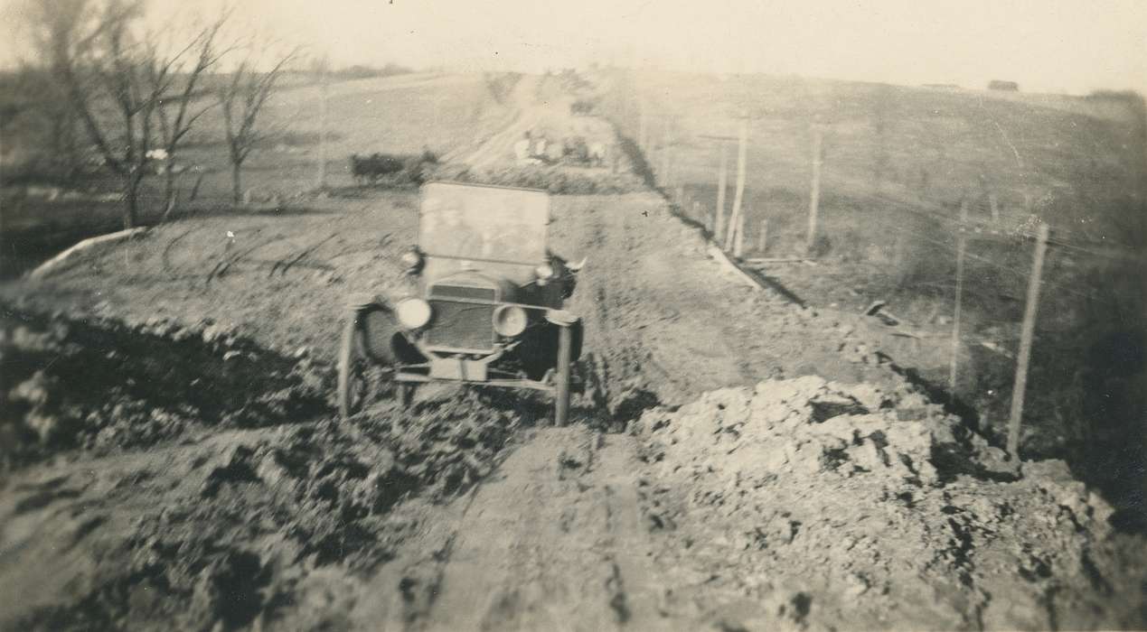 history of Iowa, Waverly Public Library, muddy, car, highway, Iowa History, Motorized Vehicles, Iowa, Waverly, IA, dirt road