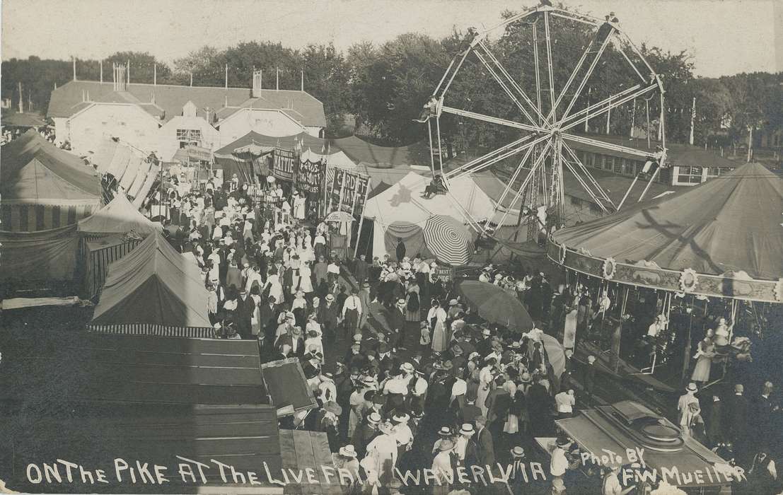 Fairs and Festivals, Iowa History, carousel, umbrella, ferris wheel, crowds, history of Iowa, signs, fair buildings, Meyer, Mary, Iowa