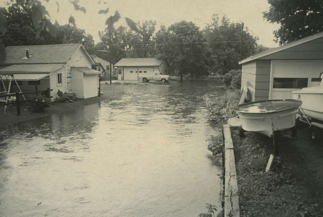 Waverly Public Library, Floods, Cities and Towns, Homes, backyard, Iowa History, pickup truck, boat, flooding, Iowa, history of Iowa, Outdoor Recreation