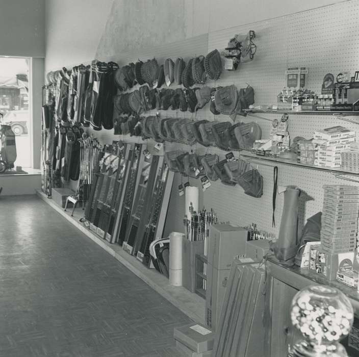 hunting, baseball mitt, golf, golf clubs, Waverly Public Library, Iowa History, baseball glove, hunting for sport, Waverly, IA, arrow, sport shop, archery, Iowa, bow hunting, store, history of Iowa, Businesses and Factories