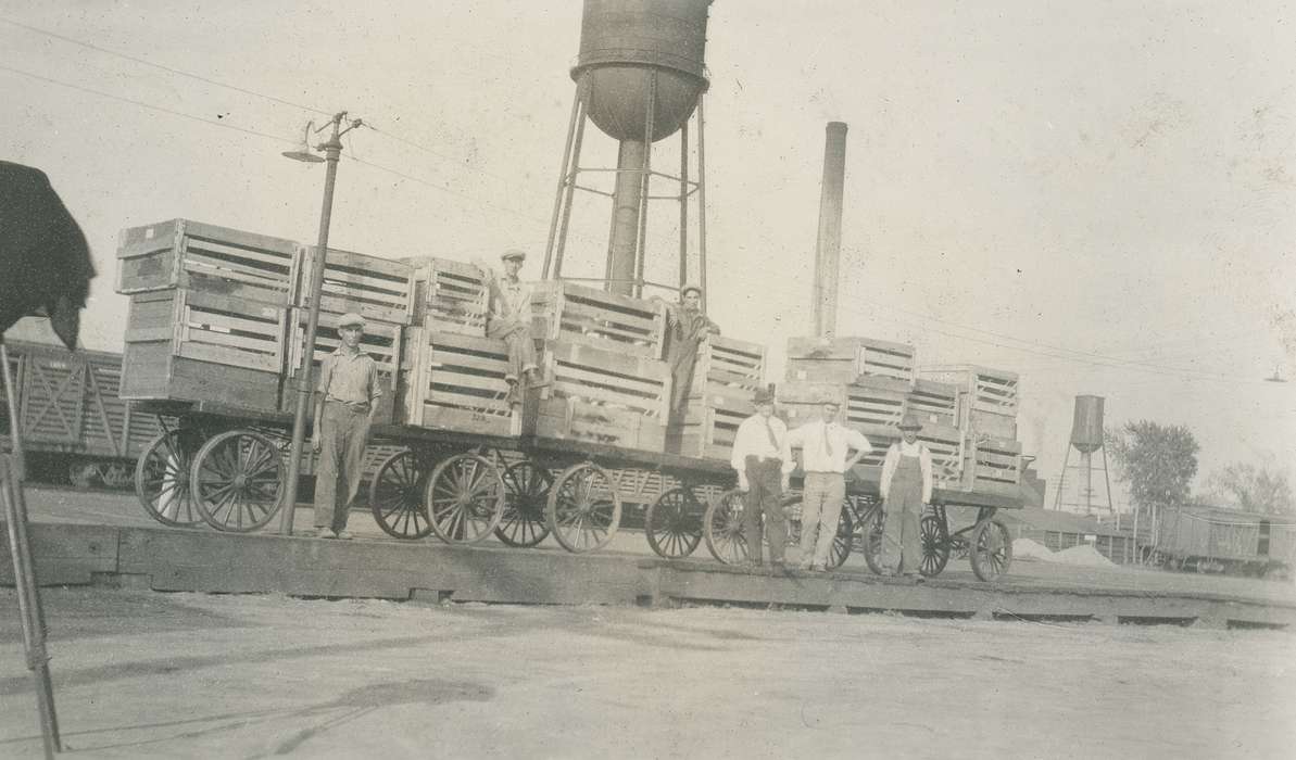 McMurray, Doug, Labor and Occupations, wagon, Webster City, IA, Portraits - Group, water tower, history of Iowa, Iowa History, crate, hatchery, Iowa, Businesses and Factories