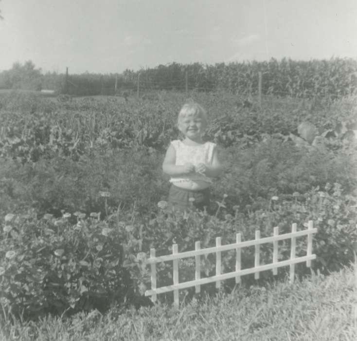 flower, smile, Iowa History, garden, Farms, history of Iowa, Leisure, Hudson, IA, Children, Bartlett, Elizabeth, Portraits - Individual, Iowa, fence