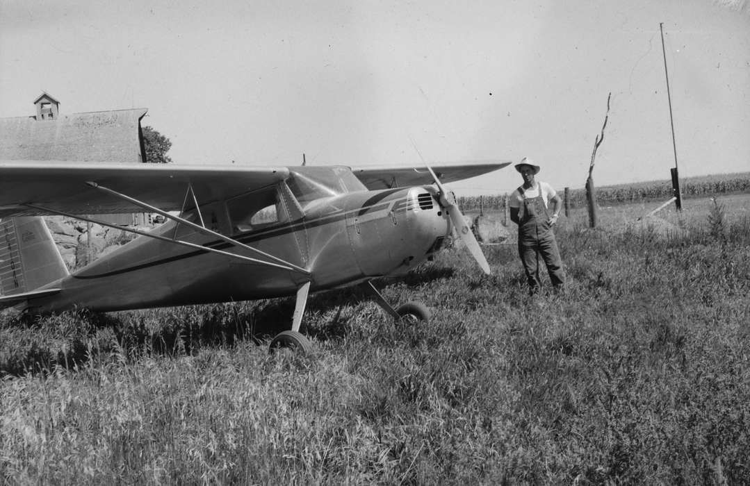 adult man, history, prairie grass, Photos, Barns, Iowa, IA, Motorized Vehicles, Portraits - Individual, overalls, airplane, United States, ia, sun hat, Coon Rapids Enterprise, historic, cornfield, barn, Coon Rapids, Farms