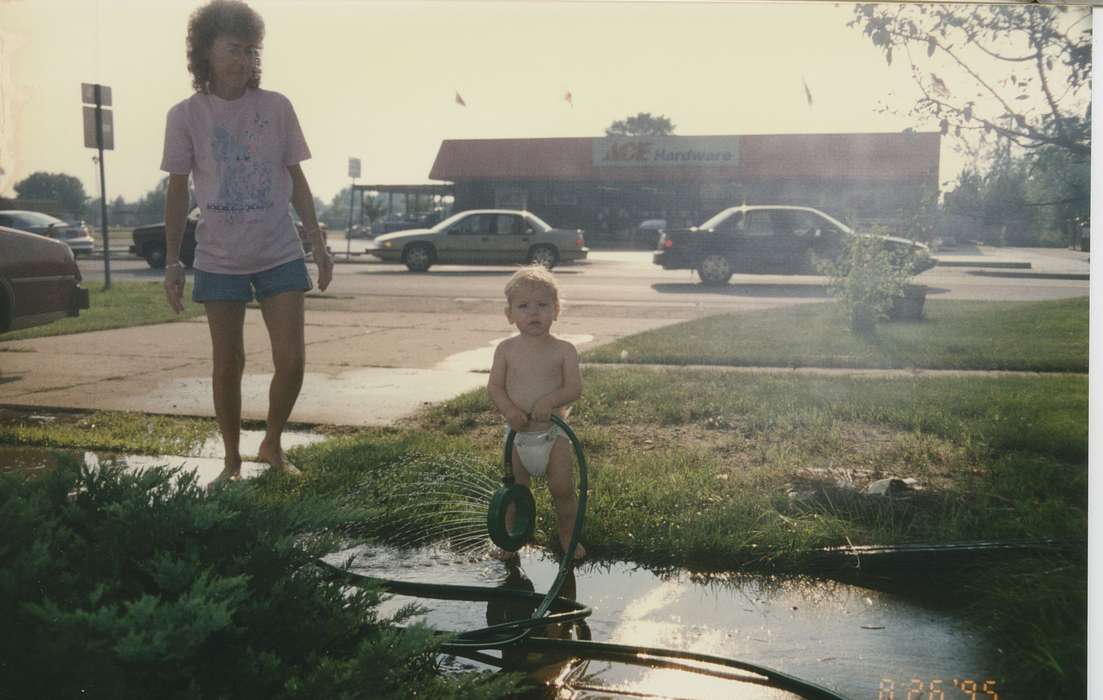 Leisure, Iowa, Children, history of Iowa, car, sprinkler, Cities and Towns, diaper, Iowa History, Motorized Vehicles, Twitchell, Hannah, hardware store, Grinnell, IA