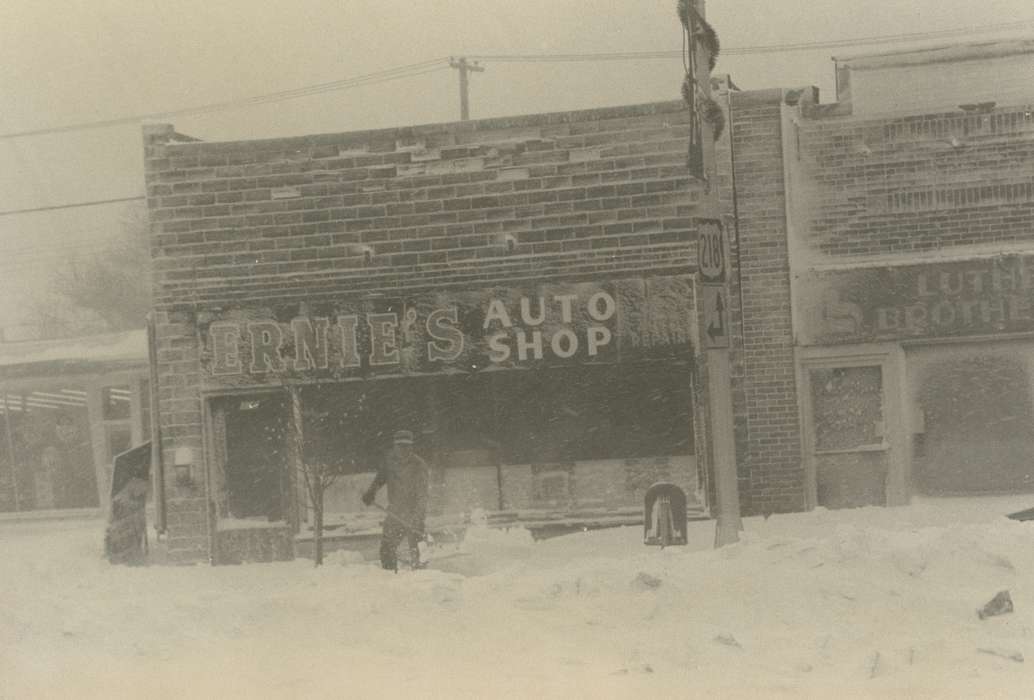 shoveling, snow day, blizzard, Iowa History, mainstreet, Winter, Waverly, IA, auto shop, Iowa, Waverly Public Library, history of Iowa