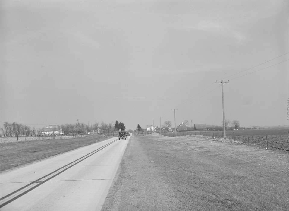 Homes, history of Iowa, Farms, automobile, ditch, electrical wires, Iowa, country, Landscapes, barbed wire fence, Library of Congress, Motorized Vehicles, paved road, Iowa History