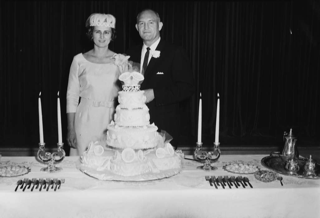 Portraits - Group, Food and Meals, Families, history, Holidays, wife, Photos, candle, fork, Iowa, cake, IA, couple, United States, ia, Coon Rapids Enterprise, wedding cake, historic, Weddings, husband, Coon Rapids